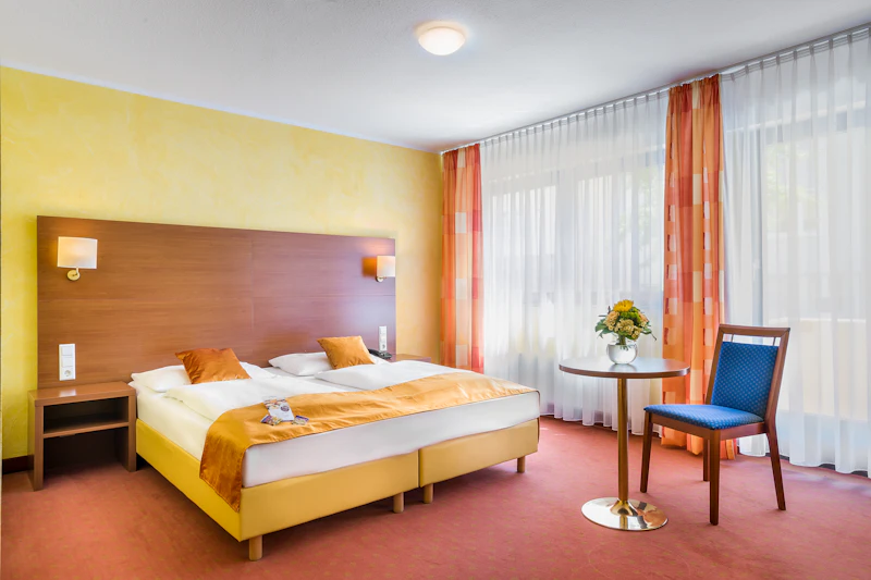 Doppelzimmer Standard - Novum Hotel Rega Stuttgart